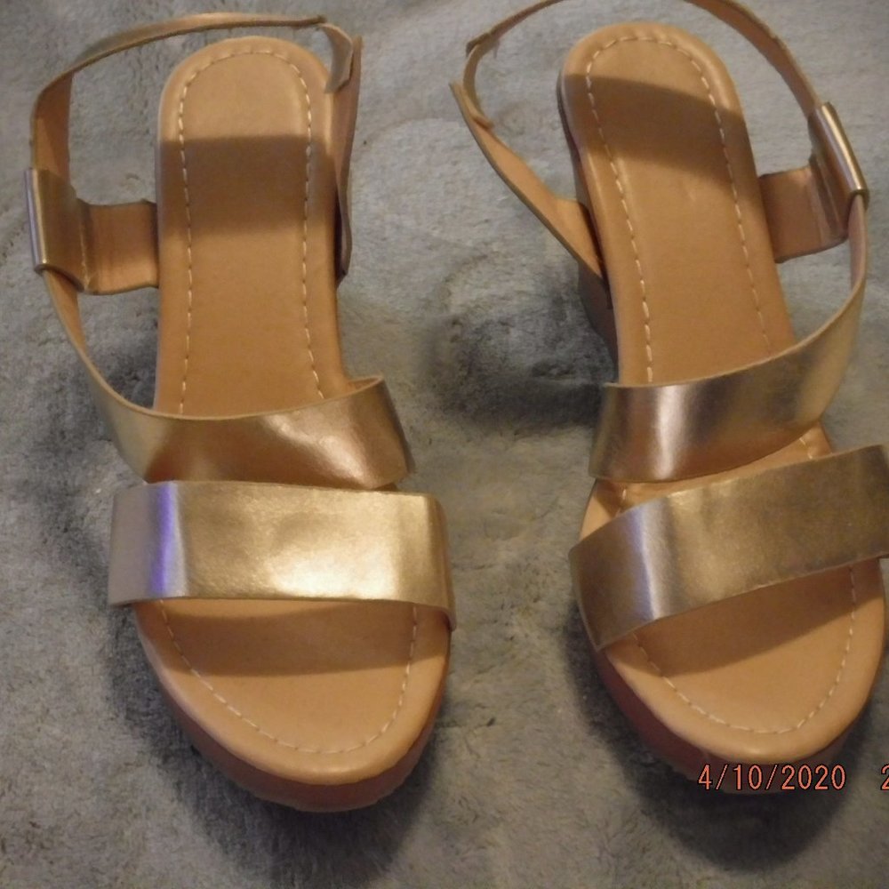 Gold open toe 3 1/2 " heel.